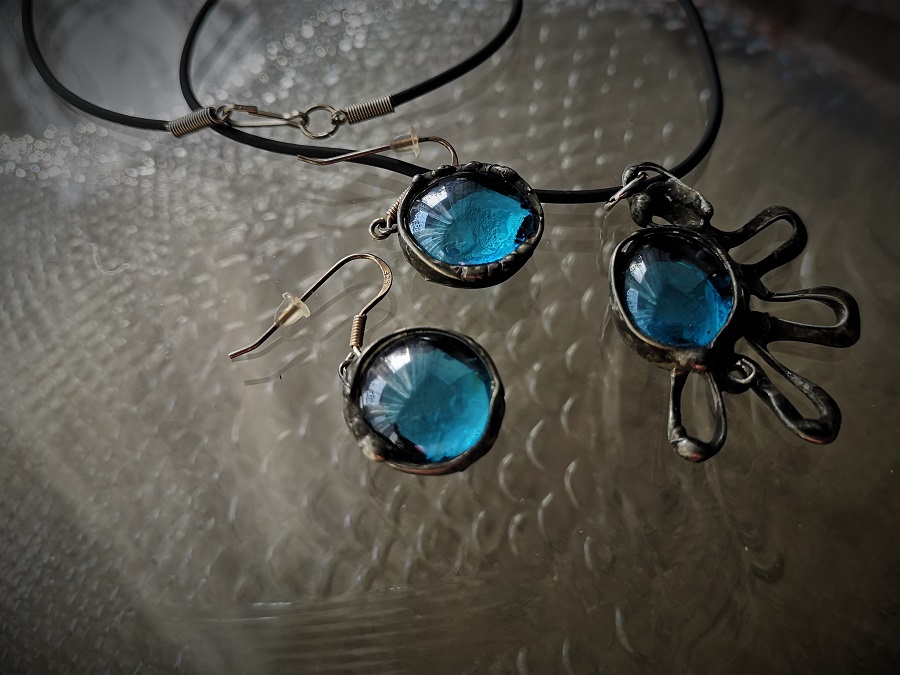 Cínovaný šperk, Atlantida